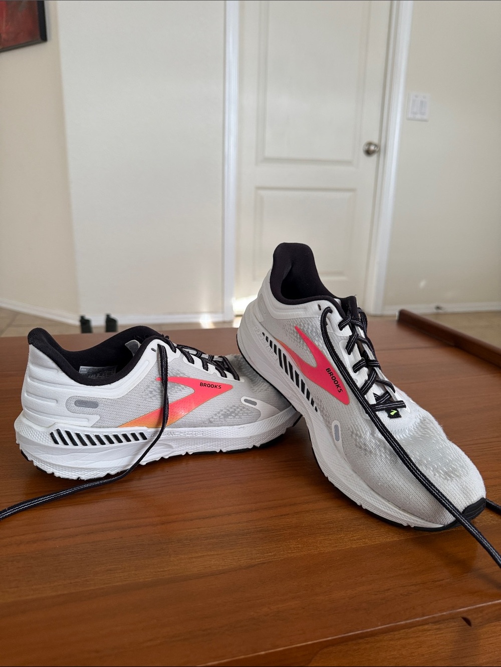 Brooks White Running Sneakers with Pink Accent and Black Trim